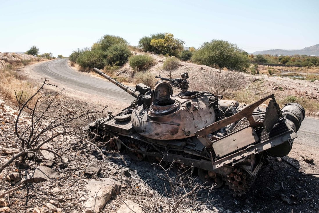 A damaged tank stands abandoned on a road near Humera, Ethiopia in November 2020. Photo: AFP