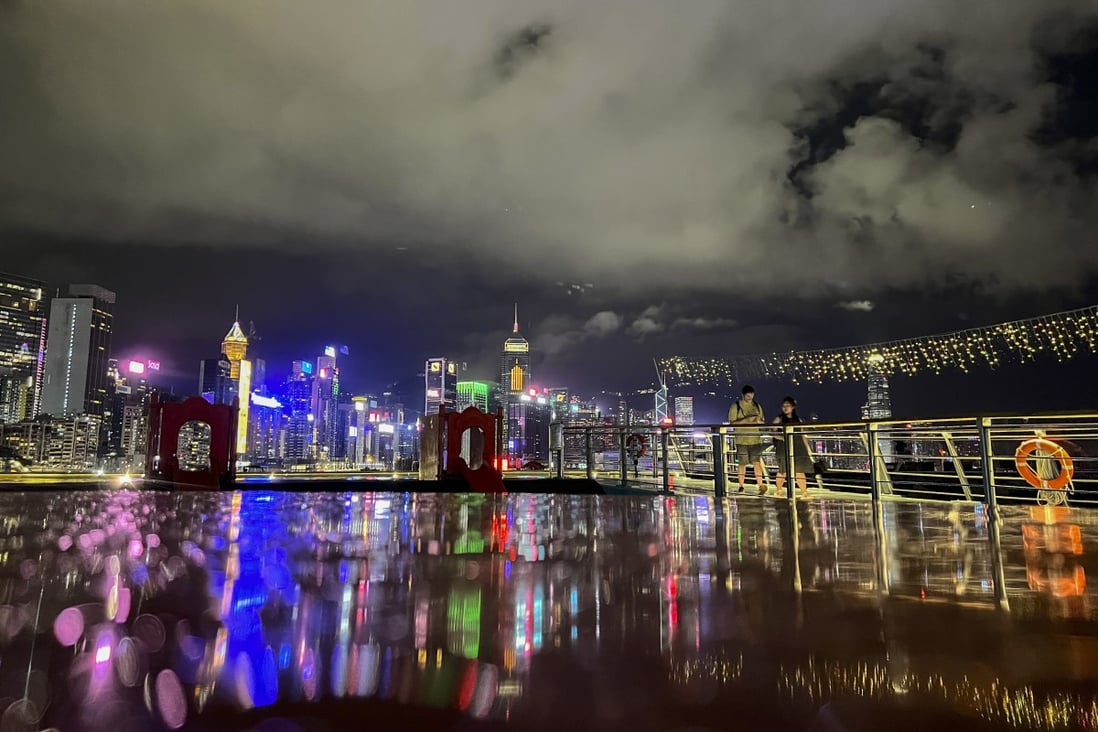 The brightly lit Hong Kong skyline is reflected in water at the East Coast Park precinct in Tin Hau on August 5. Photo: Martin Chan