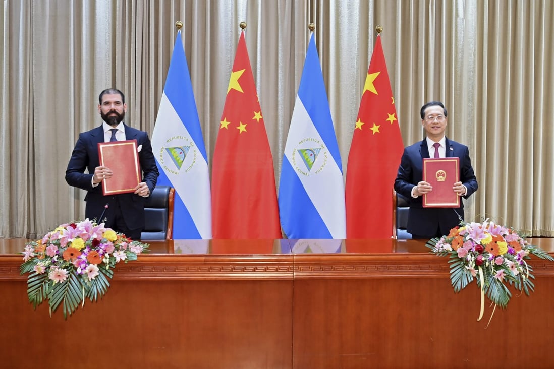 Laureano Ortega Murillo (left), son of and advisor to Nicaraguan President Daniel Ortega, left, and Chinese vice foreign minister Ma Zhaoxu in December. Photo: AP