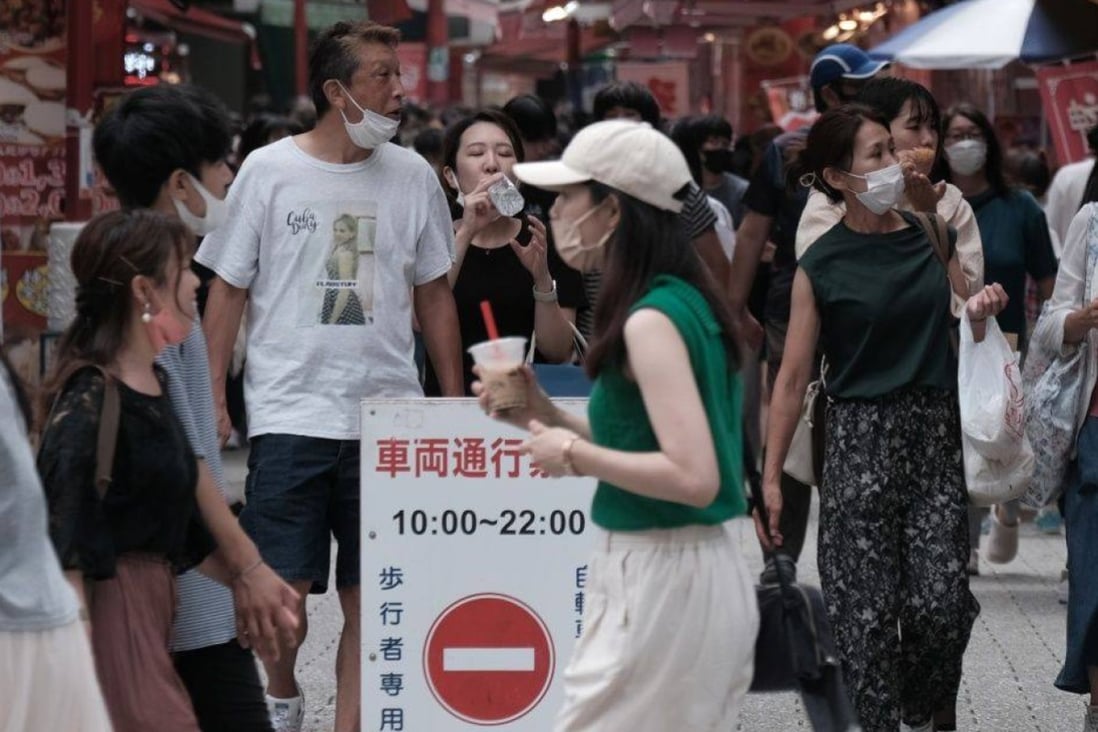 Visitors at Nankin-machi in Kobe, Hyogo Prefecture, Japan. The country is contemplating allowing asymptomatic Covid patients to leave isolation. Photo: Bloomberg/File