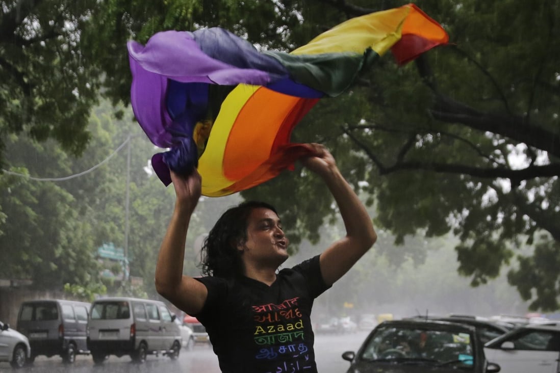 A gay rights activist celebrates after the country’s top court struck down a colonial-era law that made homosexual acts punishable by up to 10 years in prison, in New Delhi, India Sept. 6, 2018, a landmark victory for gay rights that one judge said would “pave the way for a better future.” Photo: AP/File