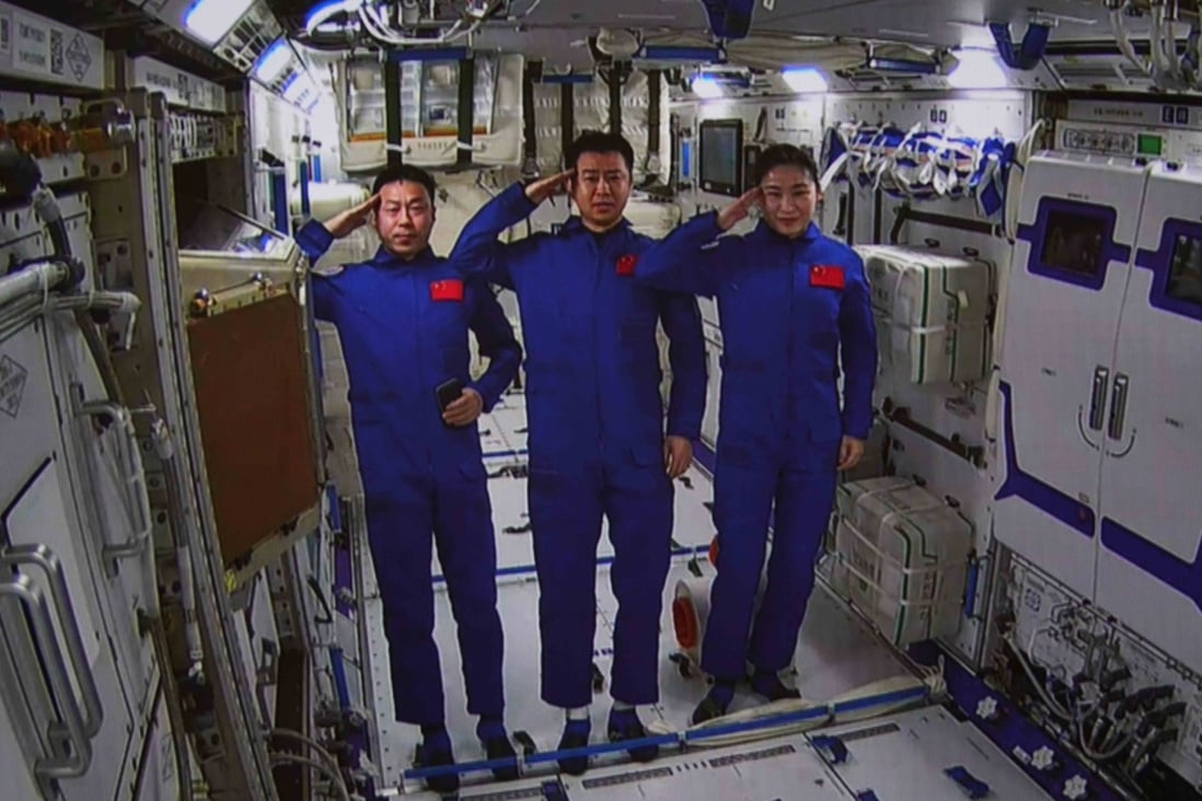 A July 25 screen image of taikonauts (from left) Cai Xuzhe, Chen Dong and Liu Yang in the first module of China’s space station. Photo: Xinhua
