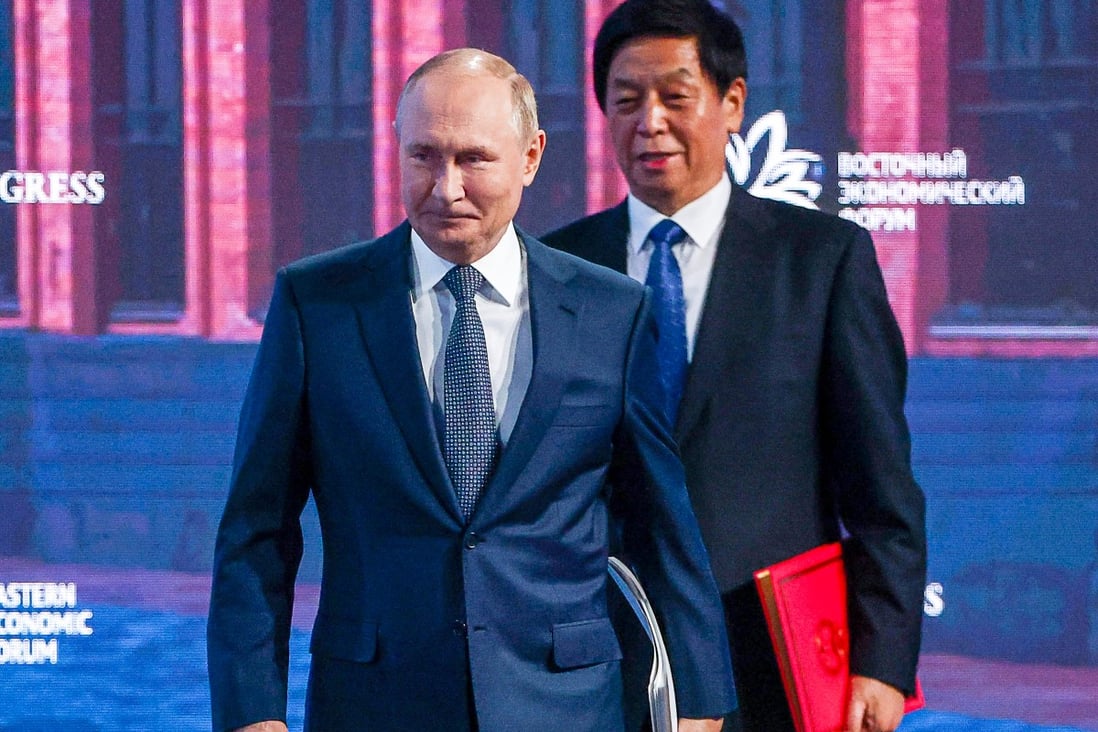 Russian President Vladimir Putin and China’s No 3 official, Li Zhanshu, arrive for the plenary session of the Eastern Economic Forum in Vladivostok on Wednesday. Photo: Tass via AP