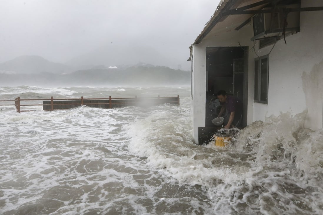 Strong waves reach homes in Lei Yue Mun as Typhoon Hato hits Hong Kong on August 23, 2017. Photo: Sam Tsang