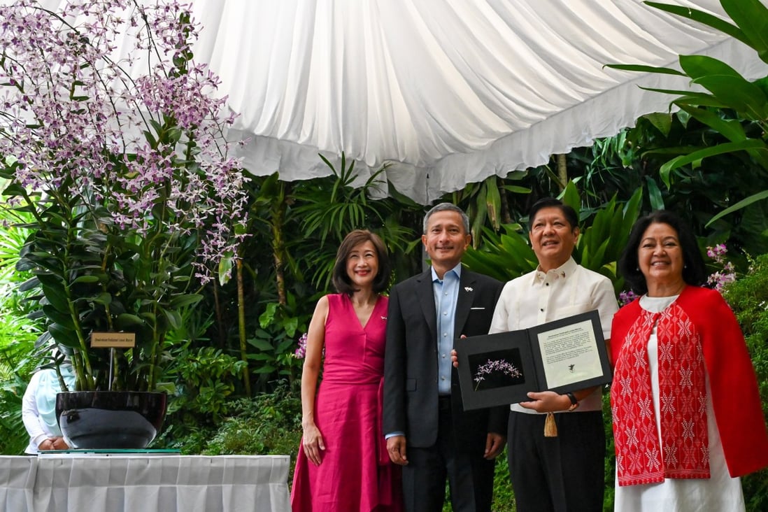 Philippine President Ferdinand ‘Bongbong’ Marcos Jnr and his wife First Lady Louise Araneta-Marcos (right) with Singapore Foreign Minister Vivian Balakrishnan and his wife Joy Balakrishnan at the orchid naming ceremony on Wednesday. Photo: EPA-EFE