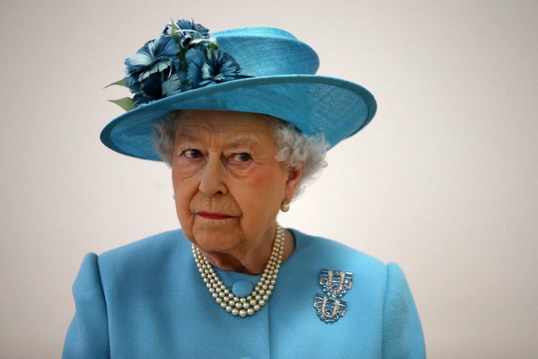 Britain’s Queen Elizabeth II’s inimitable fashion sense was defined by her bold use of colour, and her wearing of hats, at public events. Photo: Pool/AFP