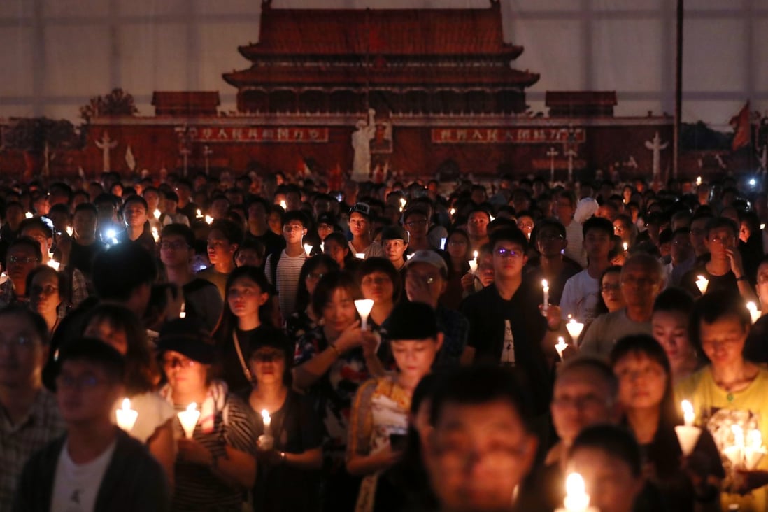 Crowds hold up their candles at the June 4 vigil in 2019 in Victoria Park, Causeway Bay. The event has since been banned on public health grounds. Photo: Sam Tsang