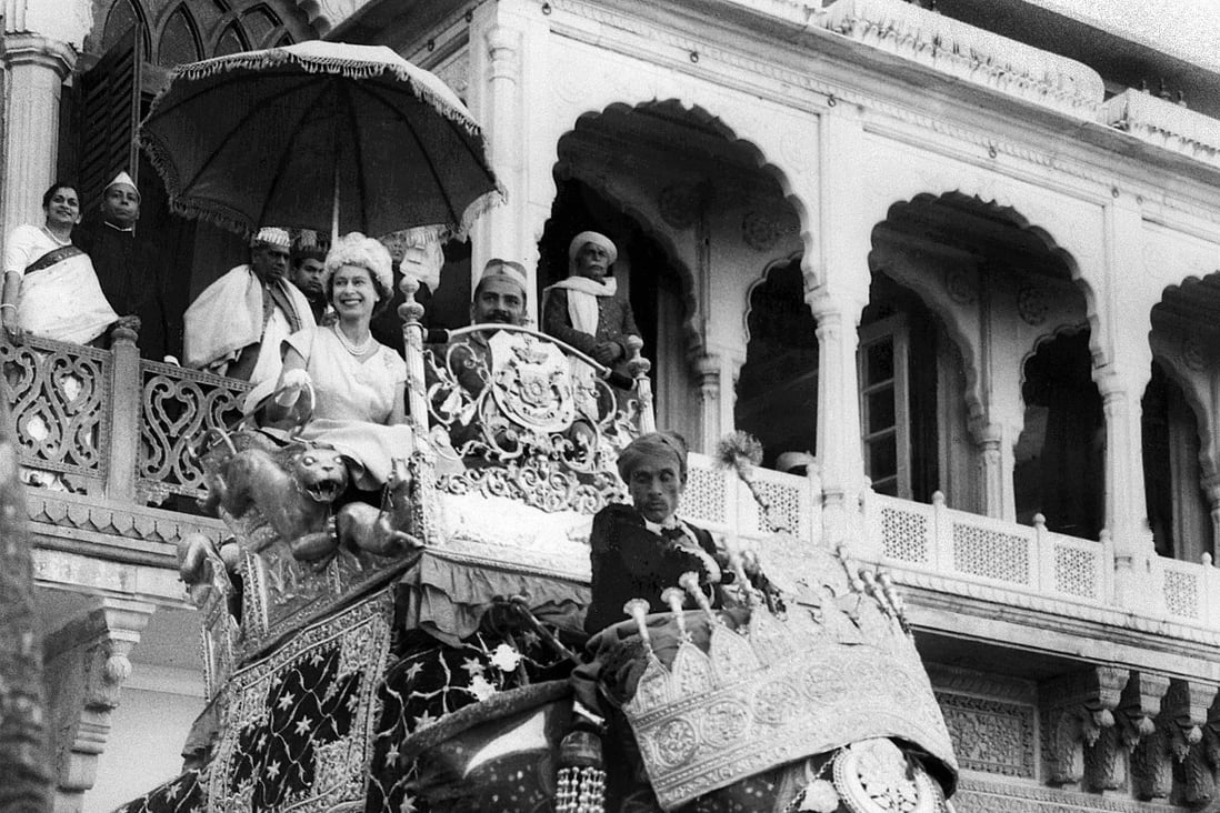 Queen Elizabeth rides an elephant during an official visit to India in 1961. Photo: AFP