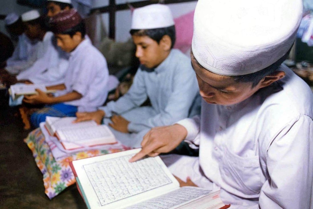Students at a madrasa in India. File photo: AFP