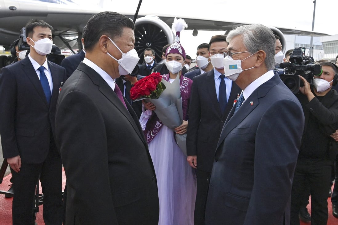 Kazakh President Kassym-Jomart Tokayev, right, welcomes China’s President Xi Jinping at the airport in Nur-Sultan on Wednesday, September 14. Photo: Kazakhstan Presidential press office/AFP