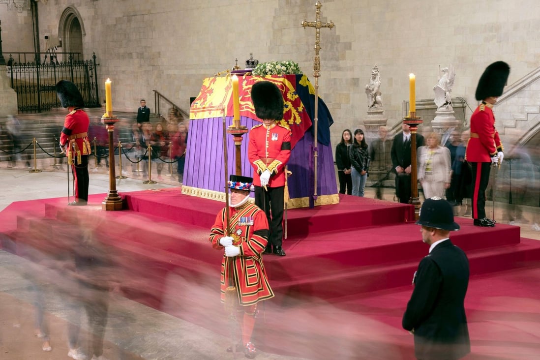 Members of the public file past the coffin of Queen Elizabeth in Westminster Hall in London. Photo: Pool/AFP