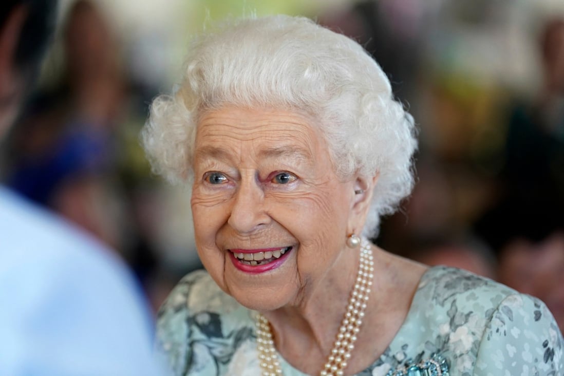 Queen Elizabeth looks on during a visit to officially open a new building at Thames Hospice, Maidenhead, England in July, 2022. The queen had a number of long-established food habits, her former private chef Darren McGrady says. Photo: Pool/AP