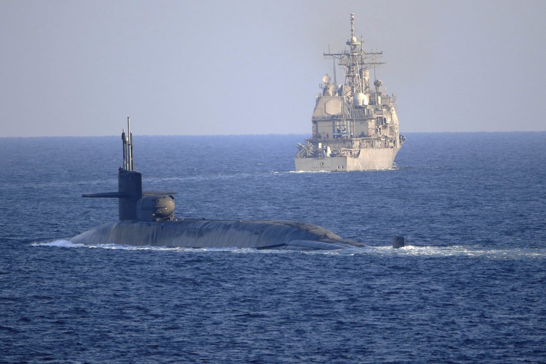 A US guided-missile submarine transits the Strait of Hormuz. The  US and Britain aim to transfer nuclear submarine technology to Australia under the Aukus alliance. Photo: TNS