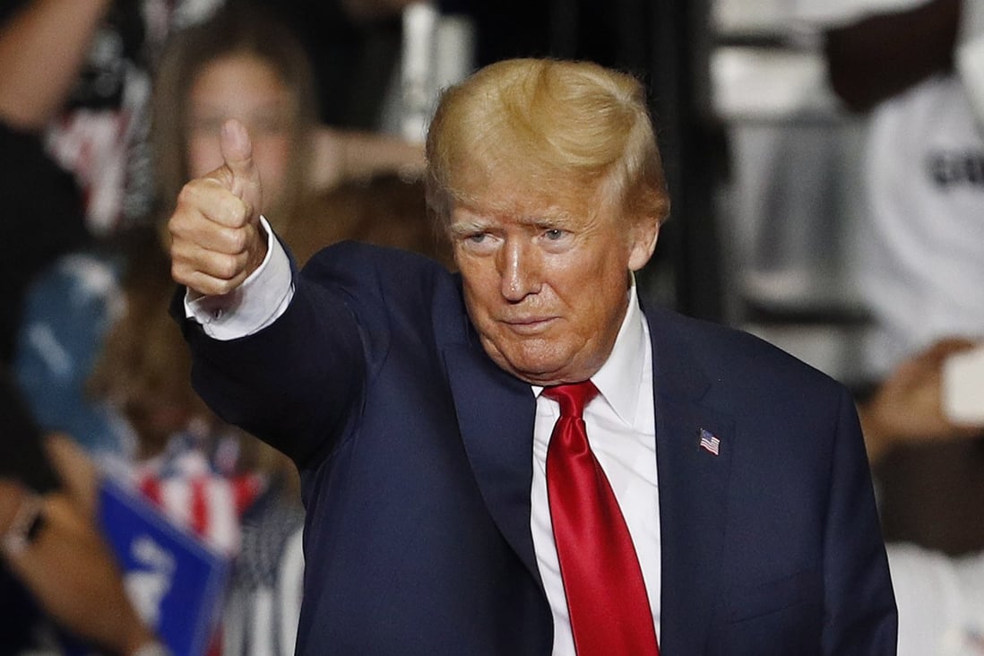 Former US president Donald Trump gestures during a rally in Youngstown, Ohio, on Saturday.  Photo: EPA-EFE
