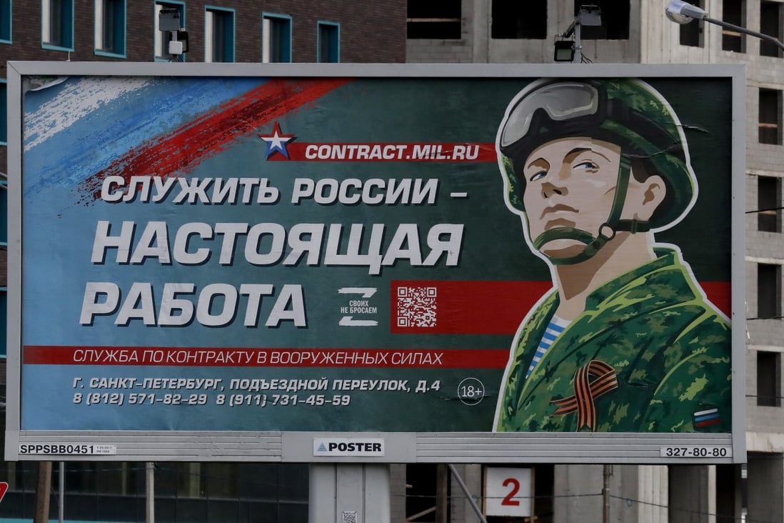 A billboard in St Petersburg, Russia, depicts a soldier with the slogan ‘Serving Russia is a real job’. Photo: EPA-EFE