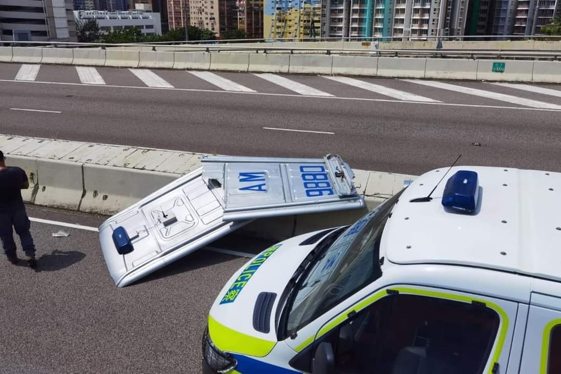 A five-metre metal roof covering came off from a moving police van on a Hong Kong highway. Photo: Facebook 