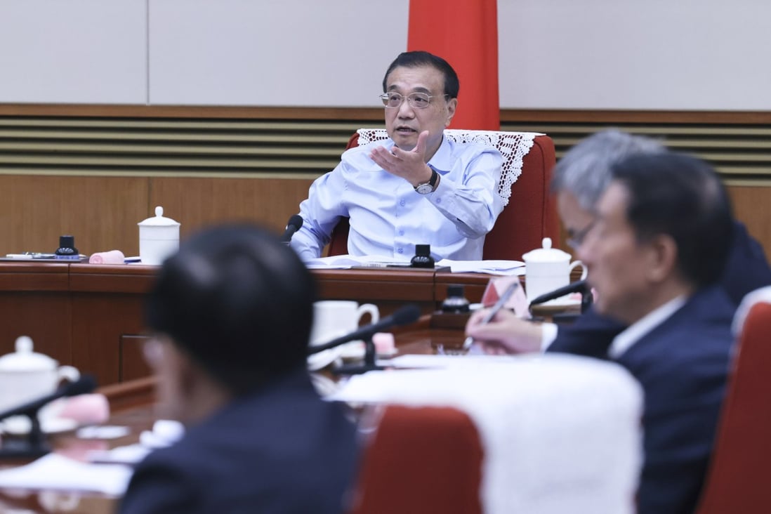 Premier Li Keqiang speaks at a meeting on government work regarding economic stabilisation for the fourth quarter on Wednesday in Beijing. Photo: Xinhua