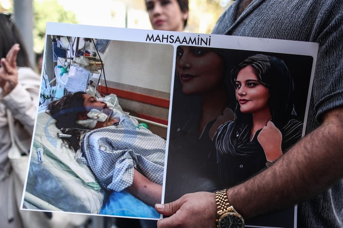 Mahsa Amini’s death has drawn widespread international condemnation. Pictured is an Iranian man holding a picture of Amini during a protest outside the Iranian consulate in Istanbul, Türkiye. Photo: EPA-EFE