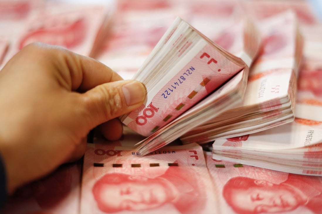 Bundles of 100-yuan notes issued by the People’s Bank of China. Photo: Shutterstock