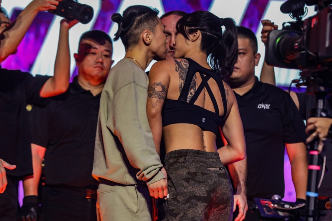 Angela Lee (right) shoulder barges Xiong Jingnan at the ONE on Prime Video 2 ceremonial weigh-ins. Photos: ONE Championship