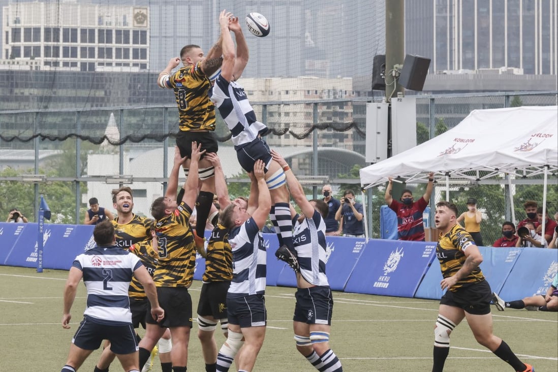 Football Club (white and blue stripes) and USRC Tigers contest a line-out at King’s Park on Saturday. Photo: Jonathan Wong