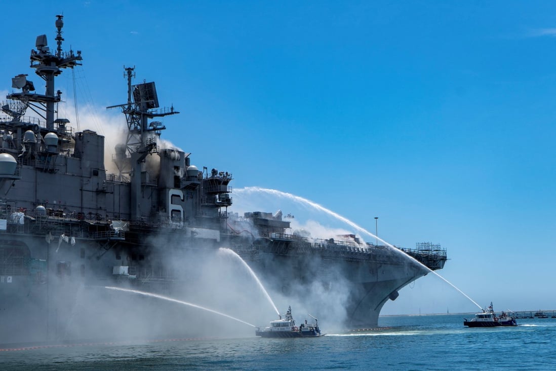 Port of San Diego Harbour Police Department boats combat a fire on board the USS Bonhomme Richard at Naval Base San Diego in California in July 2020. Photo: US Navy via Reuters
