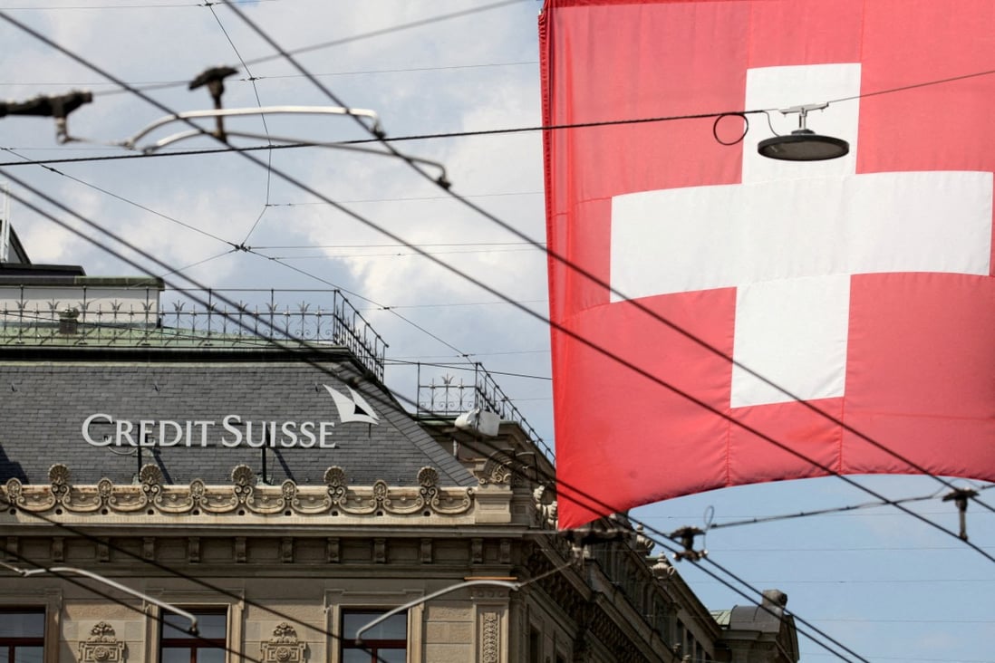 Switzerland’s national flag flies in front of the headquarters of Credit Suisse in Zurich on July 27, 2022. Photo: Reuters