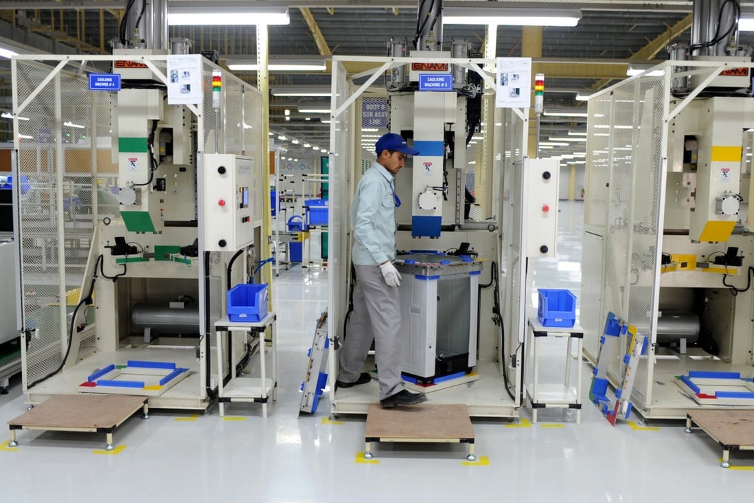 A washing machine being assembled at Panasonic’s “eco ideas” factory at Jhajjar in Haryana on December 12, 2012. Photo: AFP