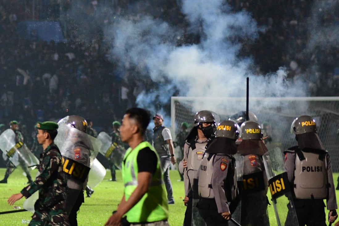 At least 125 people were killed in one of the deadliest disasters in the history of football, when officers fired tear gas in a packed stadium, triggering a stampede in Indonesia. Photo: AFP/File