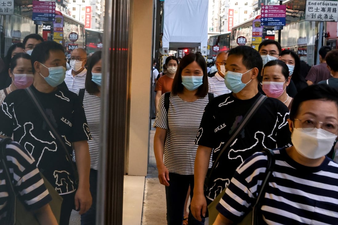 People wearing masks walk along at Nathan Road in Mong Kok on October 3. Photo: K.Y. Cheng