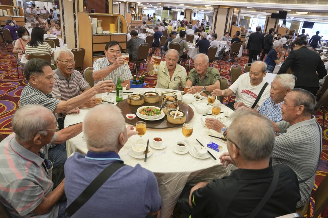 Diners have lunch at London Restaurant in Mong Kok. A maximum of 12 guests per table is now allowed under new social-distancing measures. Photo: Sam Tsang