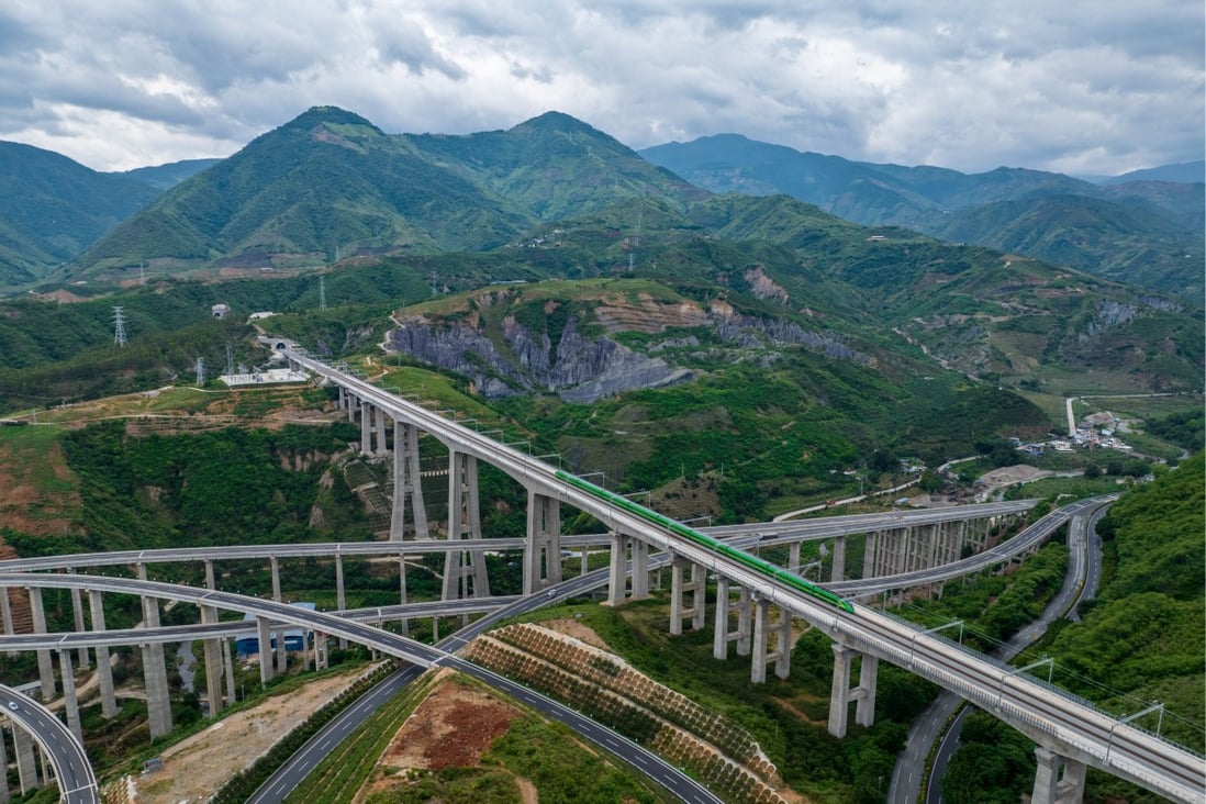 A bullet train runs through a bridge on the China-Laos Railway in southwest China’s Yunnan Province. Photo: Xinhua