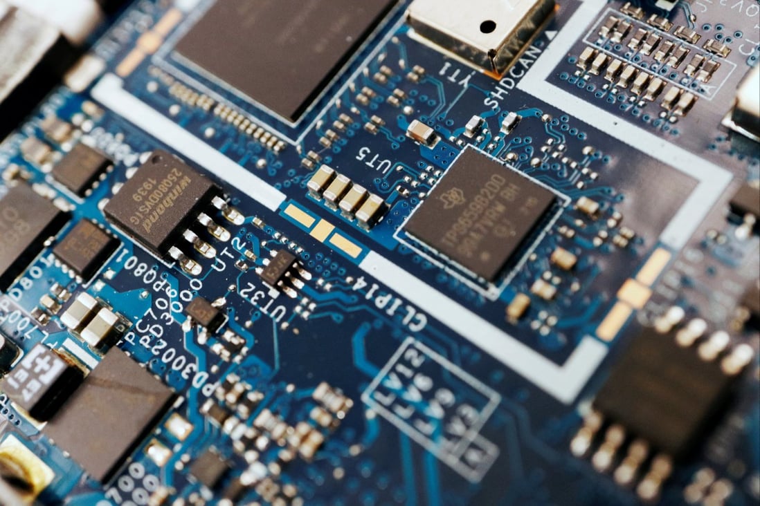 Semiconductor chips seen on a circuit board of a computer. Photo: Reuters