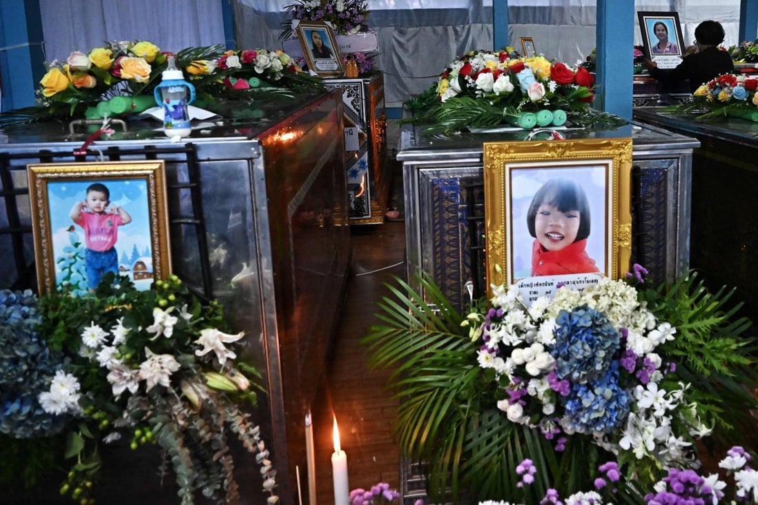 Heartbroken families prayed for the victims of a Thai nursery massacre as the king offered his support, telling relatives he “shares their grief” in a rare public interaction with his subjects. Photo: AFP