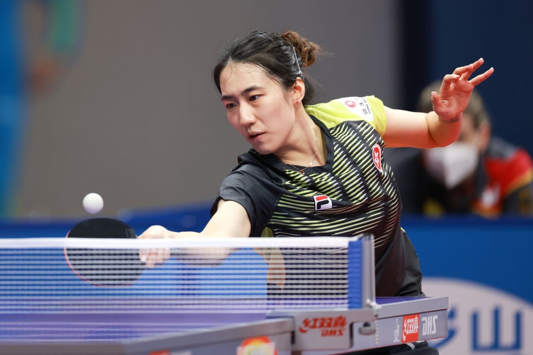 Zhu Chengzhu hits a return against Nina Mittelham of Germany at the World Team Championships in Chengdu, China. Photo: Xinhua