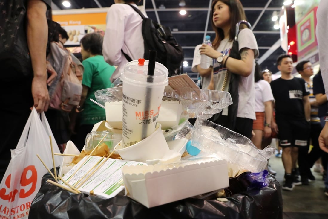 A rubbish bin overflows with plastic waste at an exhibition at the Hong Kong Convention and Exhibition Centre in Wan Chai. Photo: K. Y. Cheng