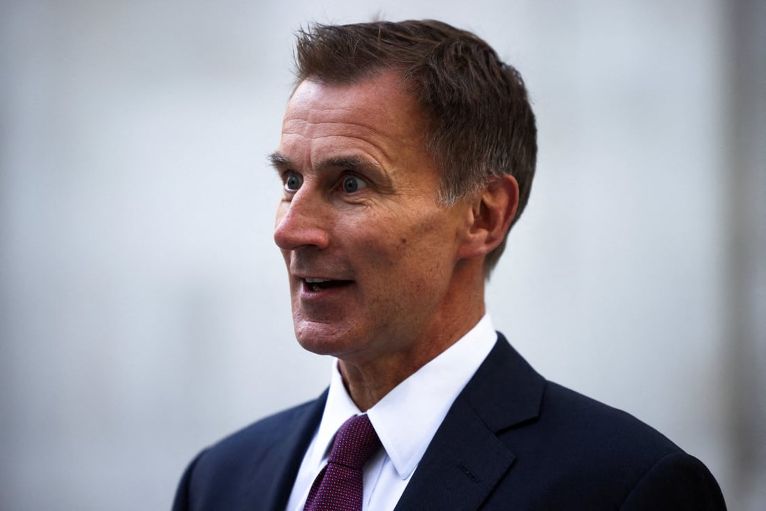 British Chancellor of the Exchequer Jeremy Hunt speaks during an interview outside the BBC headquarters in London on Saturday. Photo: Reuters