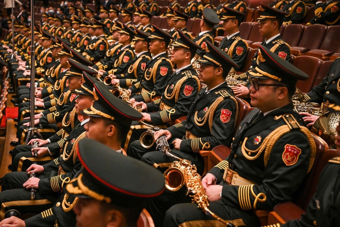 Members of the People’s Liberation Army band attend the opening session of the Communist Party congress at the Great Hall of the People in Beijing on Sunday. Photo: AFP