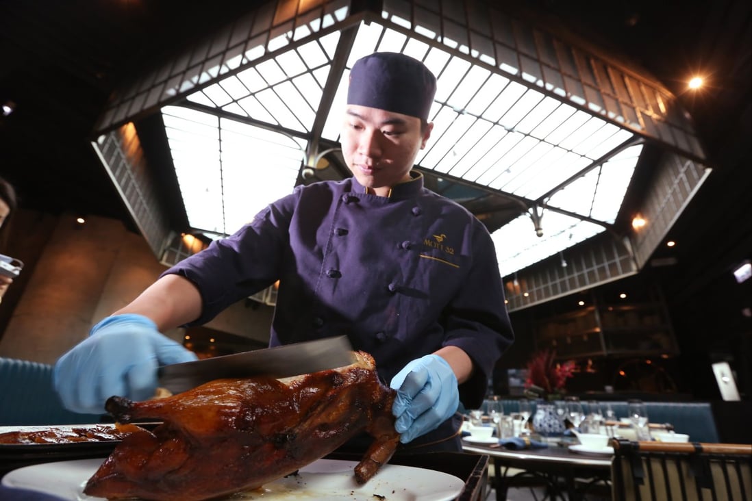 The slicing table-side of Peking duck at Chinese restaurants in Hong Kong is a form of dinner theatre to get behind. Photo: Nora Tam