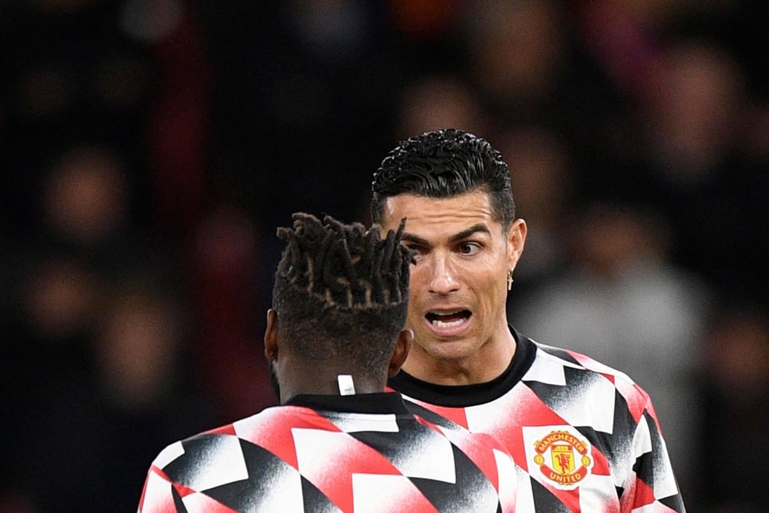 Cristiano Ronaldo (right) talks to Manchester United teammate Fred during the warm up before their side’s  Premier League game against Tottenham at Old Trafford. Photo: AFP
