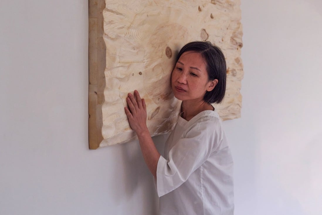 Hong Kong artist Jaffa Lam with her work “A Piece of Good Water III” (2017) at Axel Vervoordt Gallery in Wong Chuk Hang. Photo: Axel Vervoordt Gallery 