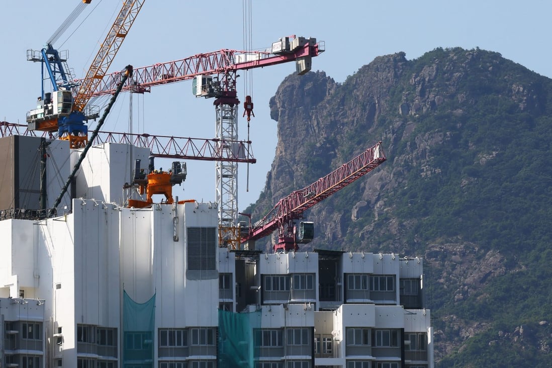 A residential building under construction in Hong Kong, with Lion Rock in the background, on October 11, 2022. Photo: Dickson Lee