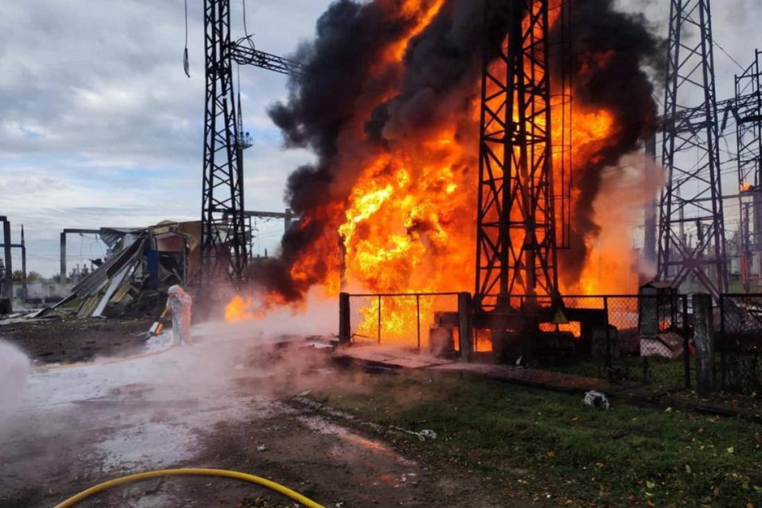 Firefighters work to put out a fire at energy infrastructure facilities in Ukraine, damaged by a Russian missile strike. Photo: Reuters