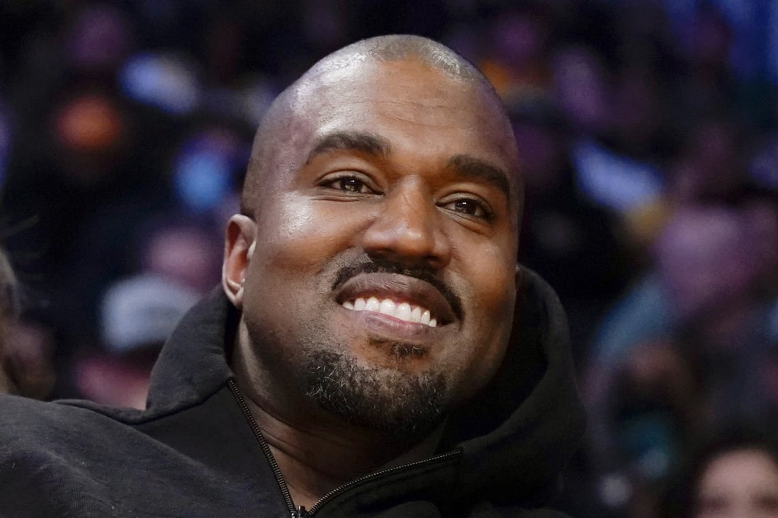 Kanye West watches an NBA game in Los Angeles in March. Photo: AP