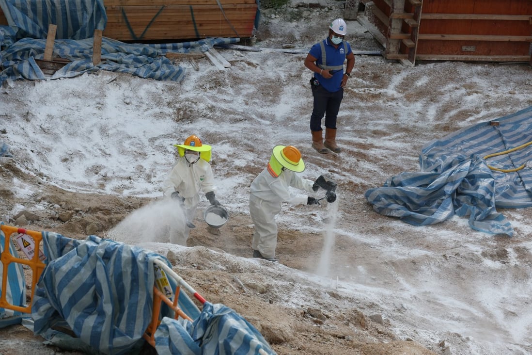 A construction site in Sham Shui Po is disinfected after soil samples were found to contain a bacterium that can cause melioidosis. Photo: Yik Yeung-man