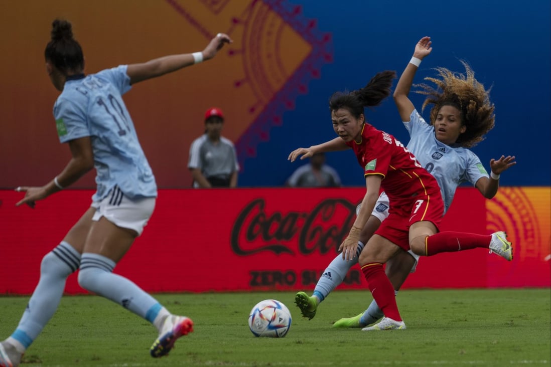 China’s Huo Yuexin, second from right, fights for the ball during the FIFA U-17 Women’s World Cup soccer match between China and Spain in Navi Mumbai, India, on October 18. Photo: AP