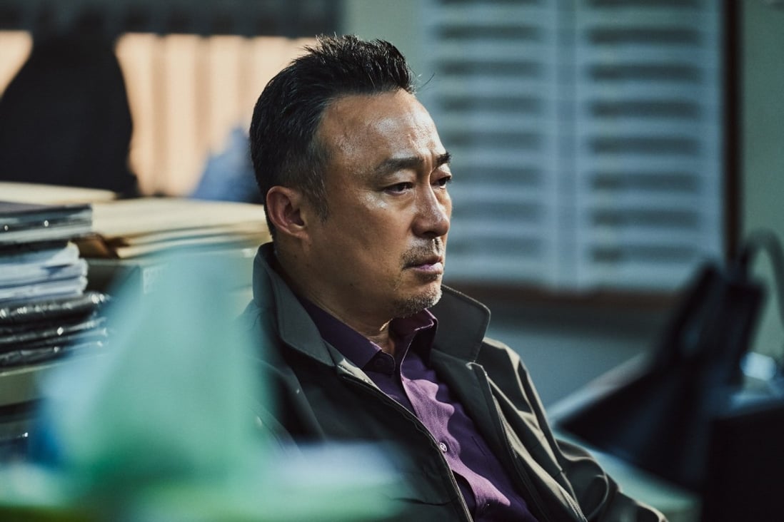 Lee Sung-min in a still from Shadow Detective, a moody and involving investigative drama on Disney+.