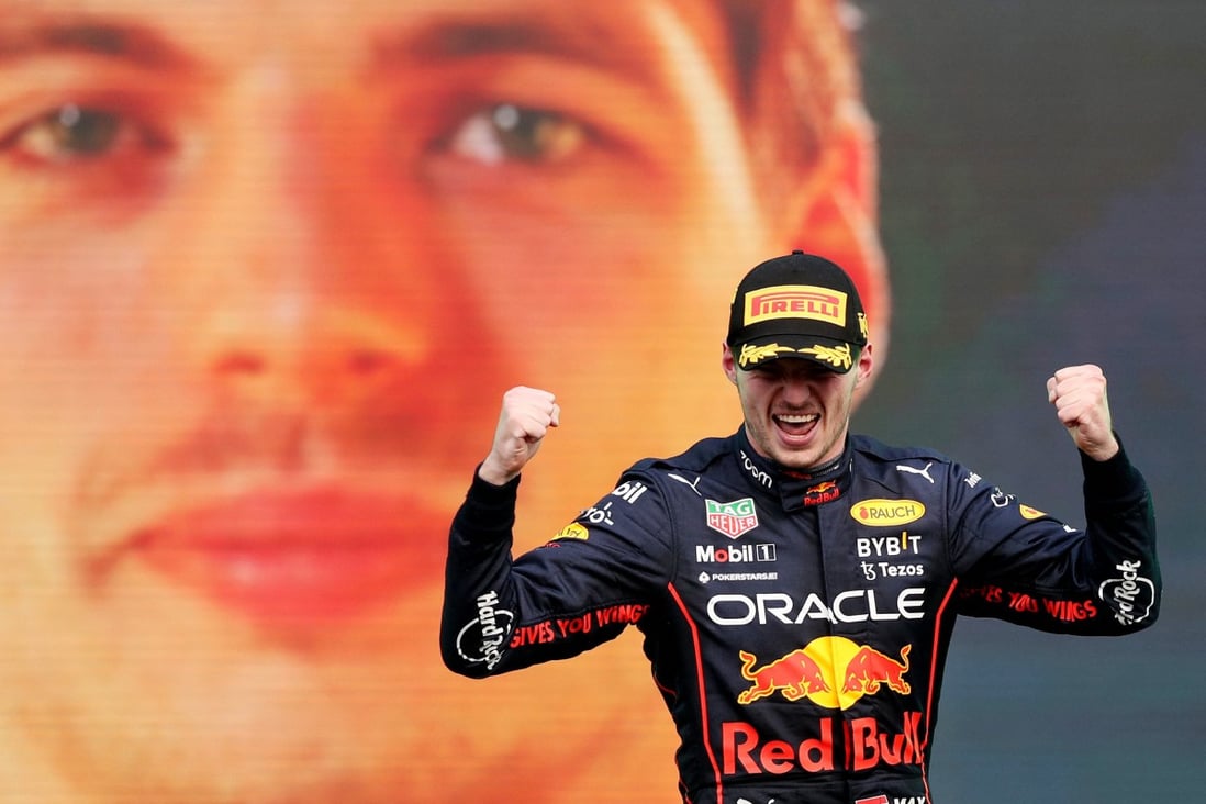 Max Verstappen celebrates after setting a new F1 record of 14 grand prix wins in a season. Photo: Reuters