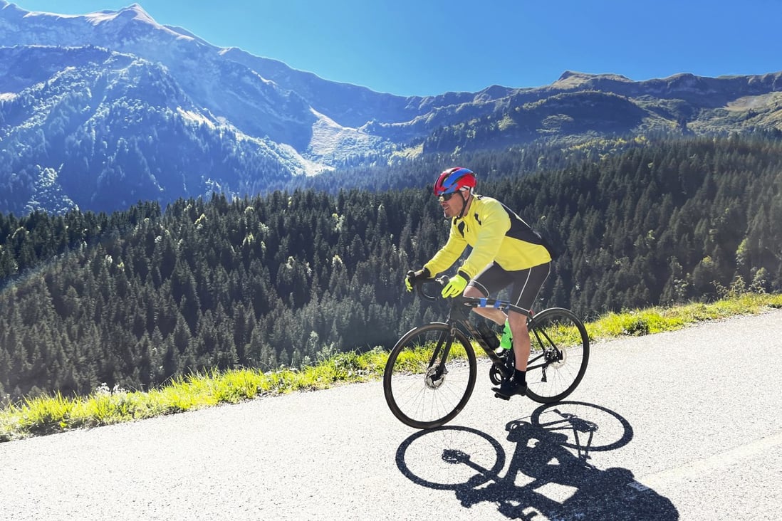 Steve Wartenberg cycles on the D4 road to the summit of the Col de la Colombiere, near the village of Le Reposoir, in the French Alps. Photo: AP