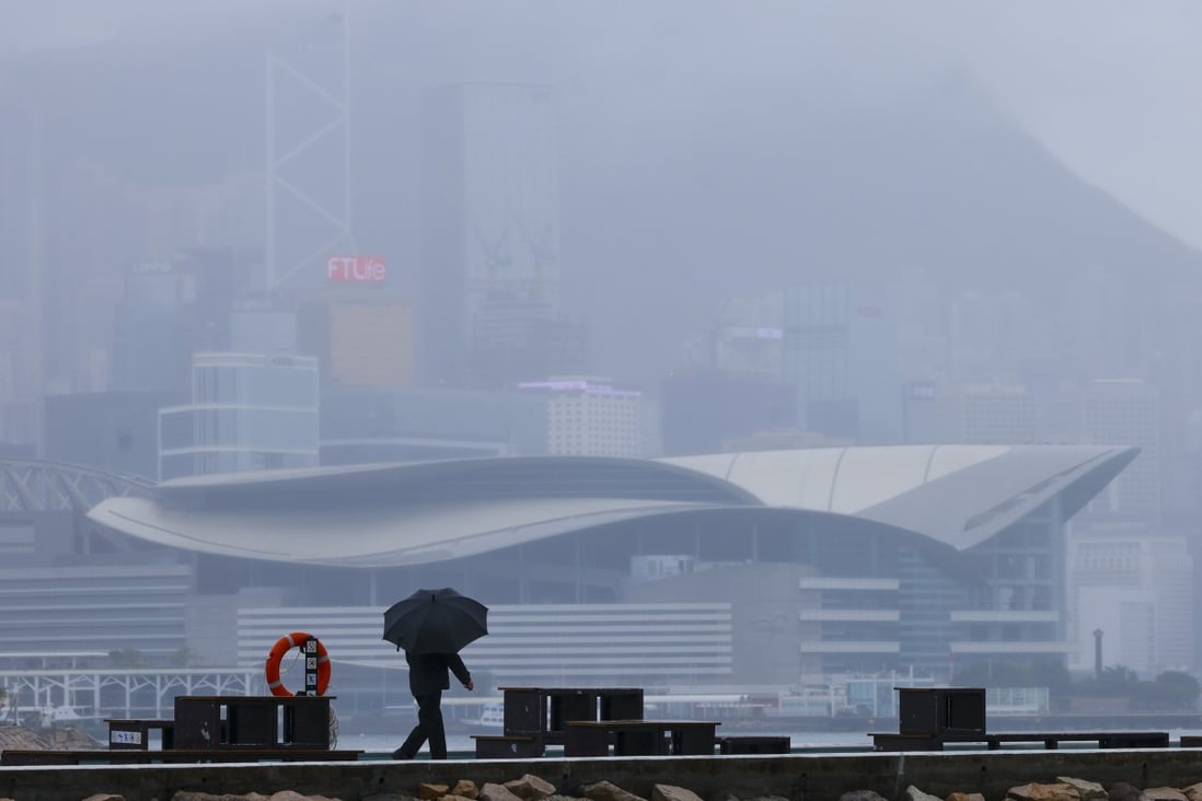 Foggy weather and rain at Victoria Harbour in the wake of Tropical Storm Nalgae. Photo: Dickson Lee